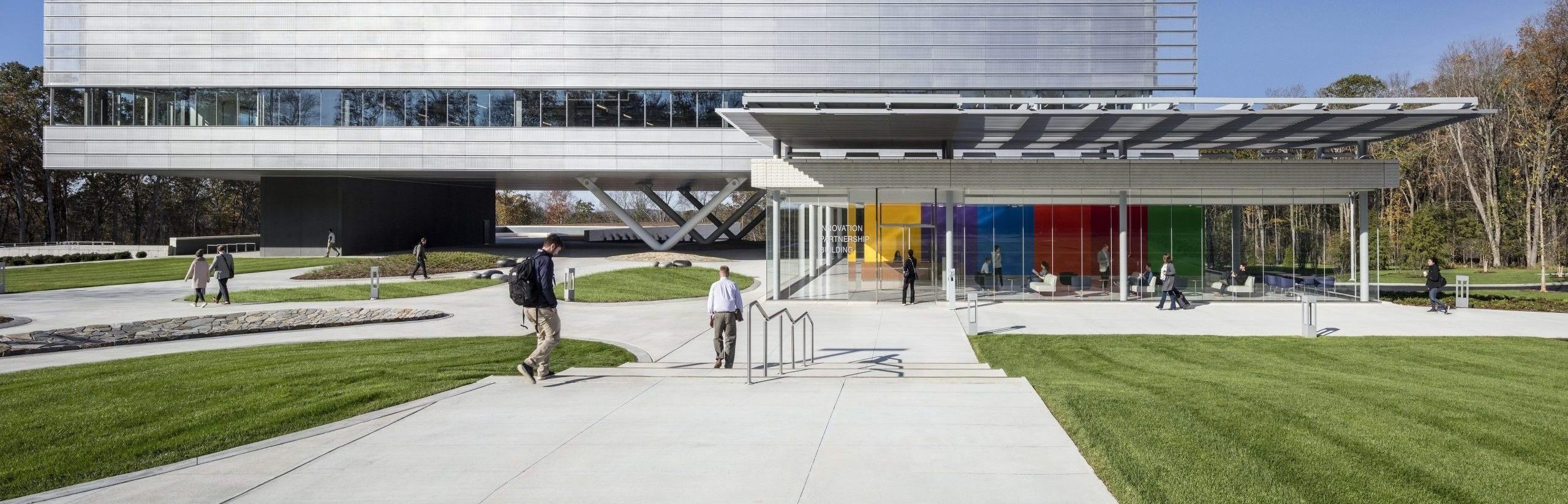 Exterior view of the UConn Innovation Partnership Building on a bright, sunny day.