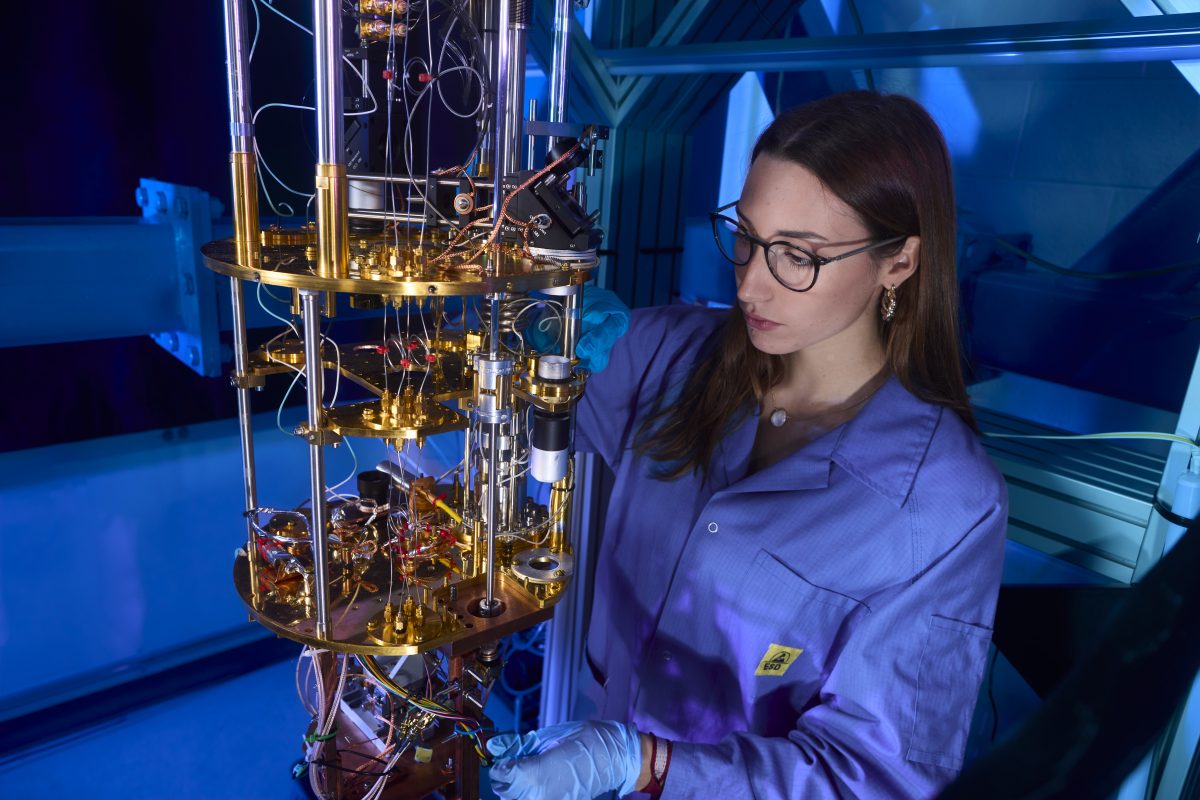 Researcher working with quantum computer
