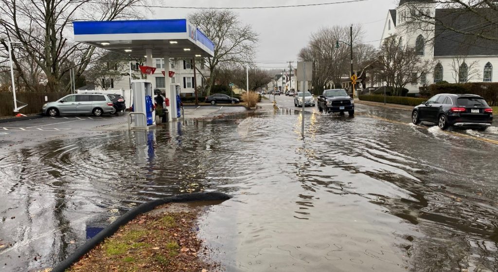 flooded road and gas station